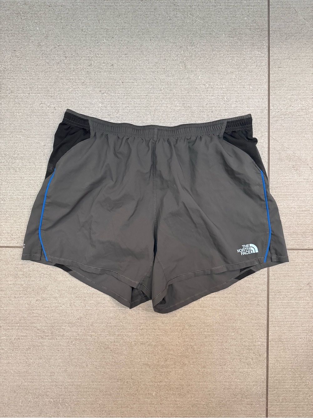 The North Face Men's Black Athletic Running Shorts with Blue Trim